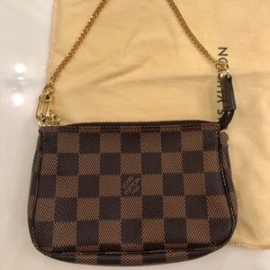Authentic Louis Vuitton mini pochette Damier Ebene